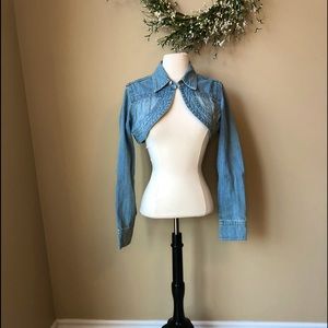 Bolero style girls ladies jean jacket. Has hook at collar.